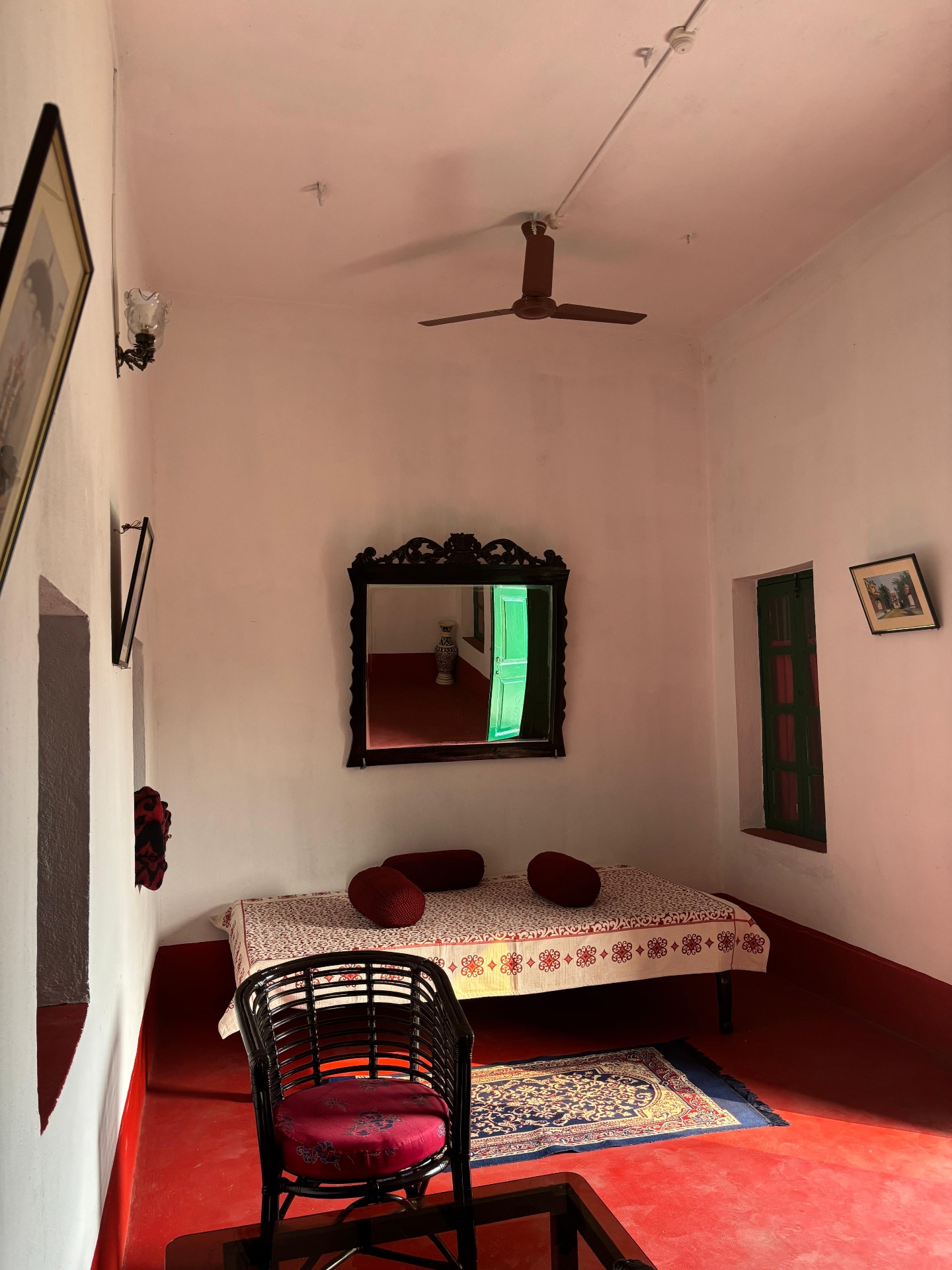 Quiet room corner with antique mirror